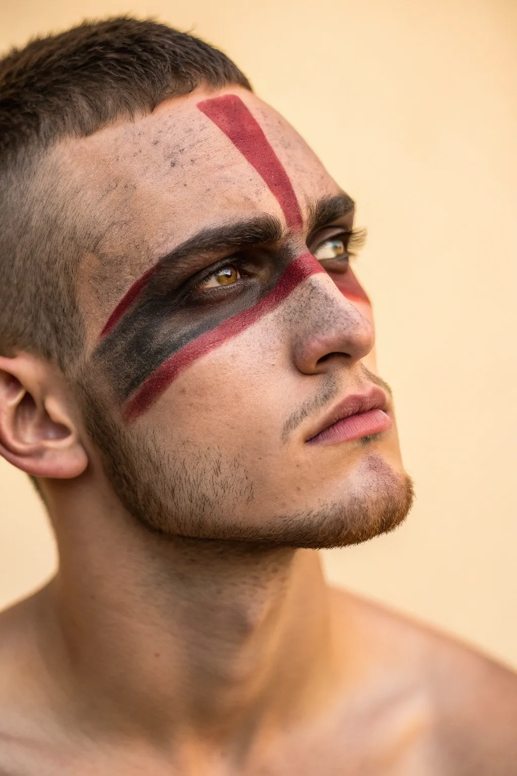 Spartan battle-scar face paint: a bold diagonal mark with shadow, red accents, and grit.