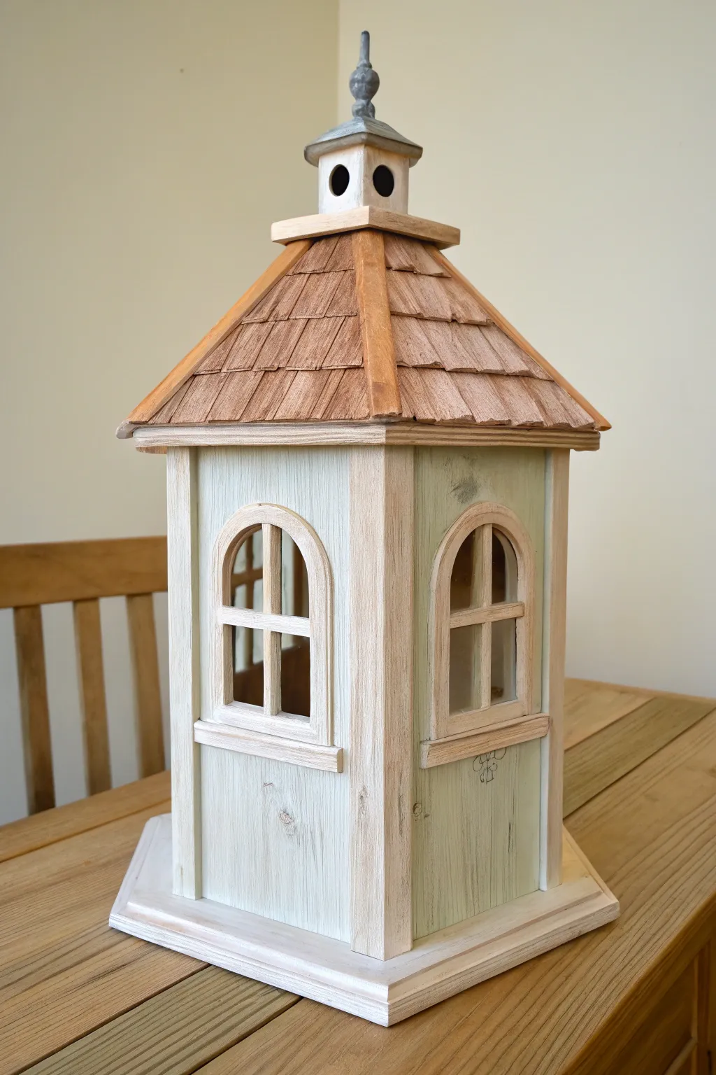 Alternating faux windows and solid panels for a charming gazebo birdhouse paint design