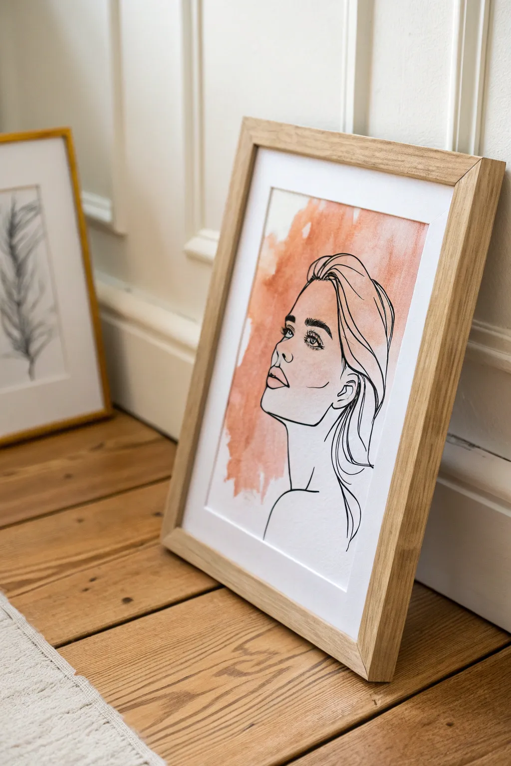 Minimal line art over a soft watercolor wash, a calm DIY home decor painting idea
