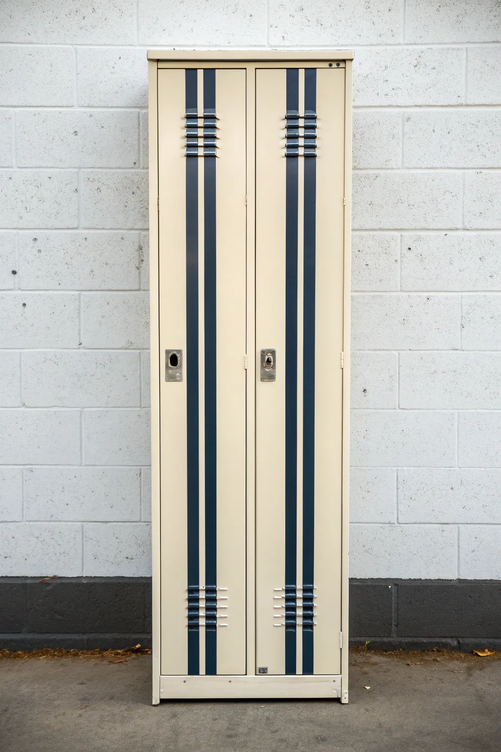 Minimalist striped locker makeover: crisp vertical lines and a satisfying vent-edge detail.