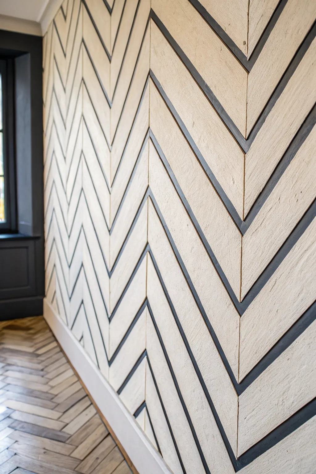 Crisp chevron tape guides on a neutral wall, alternating paint for a modern boho look.