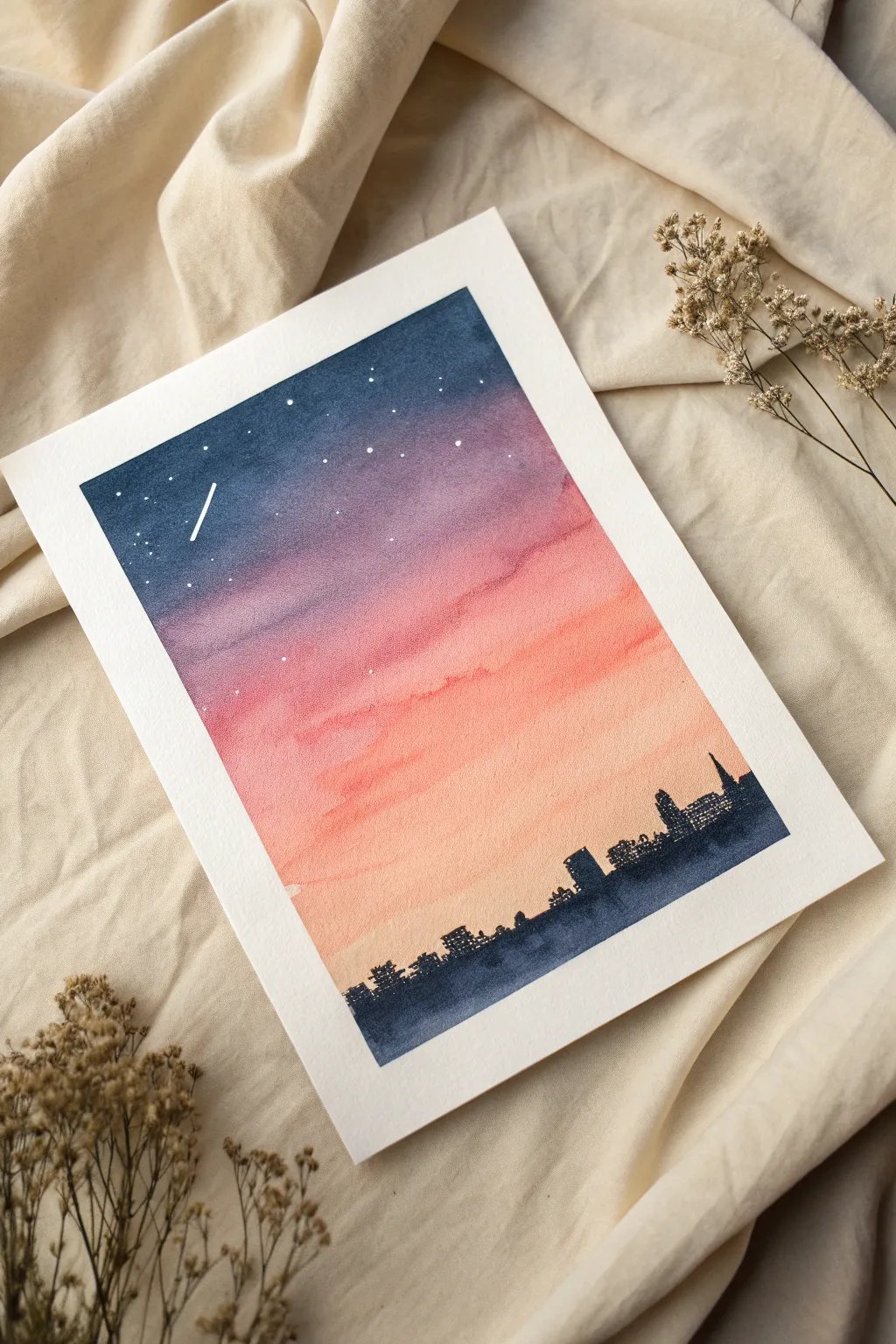 Paint a moody sunset gradient with a simple skyline silhouette for a calm, bittersweet vibe.