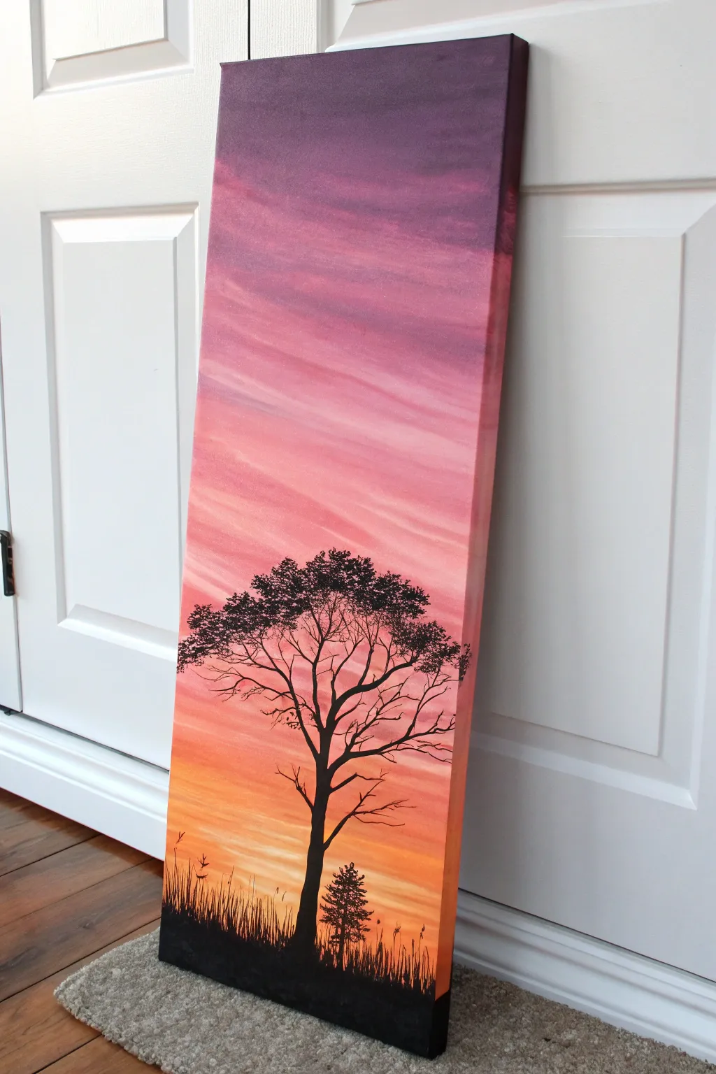 Paint a bold sunset silhouette with a silky gradient sky for instant high-contrast drama