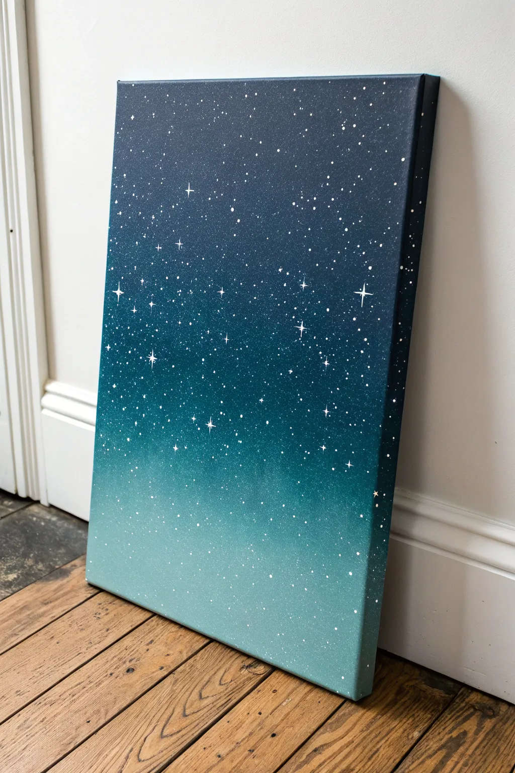 Dreamy night sky ombre on canvas with delicate star splatter, calm and minimalist.