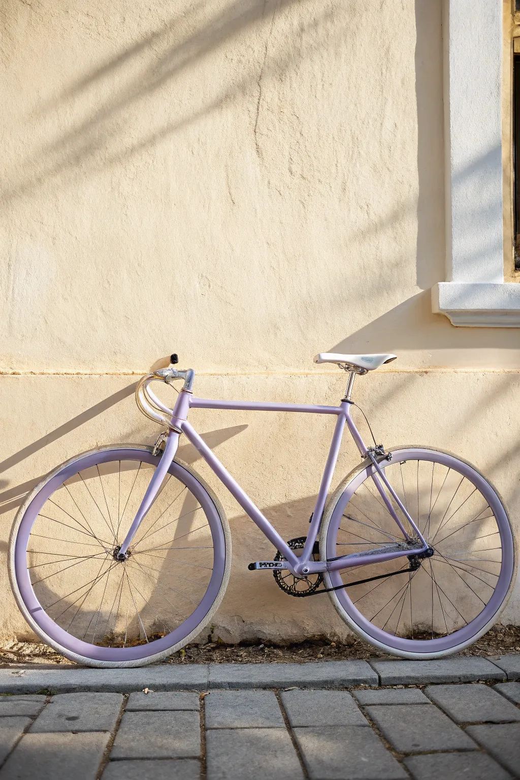 Soft pastel bicycle frame in satin lavender with airy shadows for dreamy color inspiration