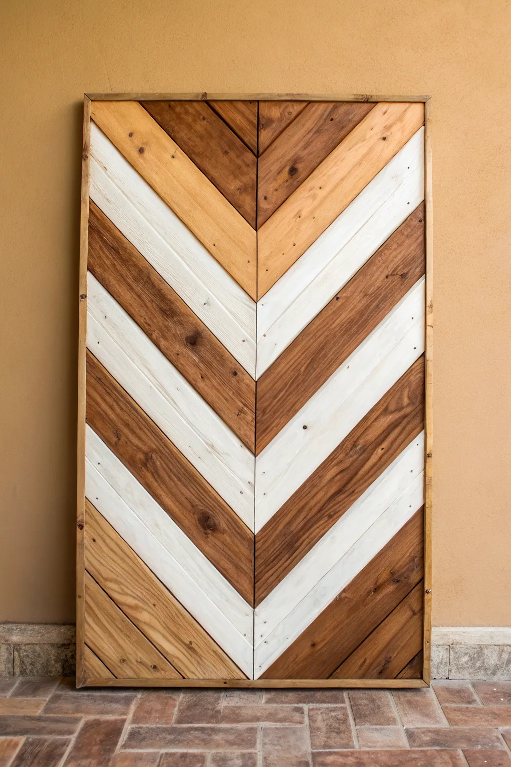 Two-tone chevron pallet panel with warm stain and matte paint, clean lines and cozy contrast