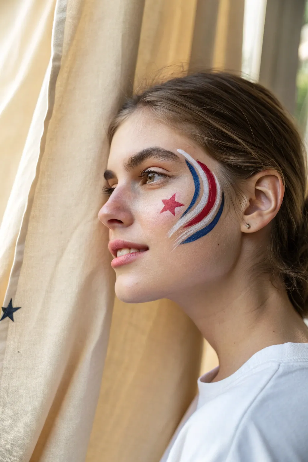 Easy Sparkler Swirl face paint in red, white and blue with star tip and soft boho minimal vibe
