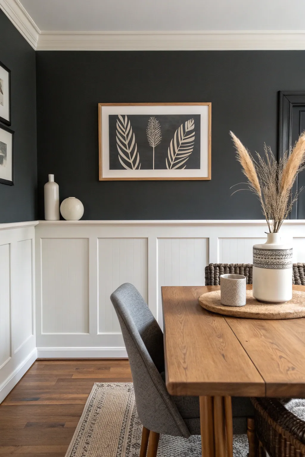 Dark above, light below: chair rail color blocking for a cozy, modern dining room
