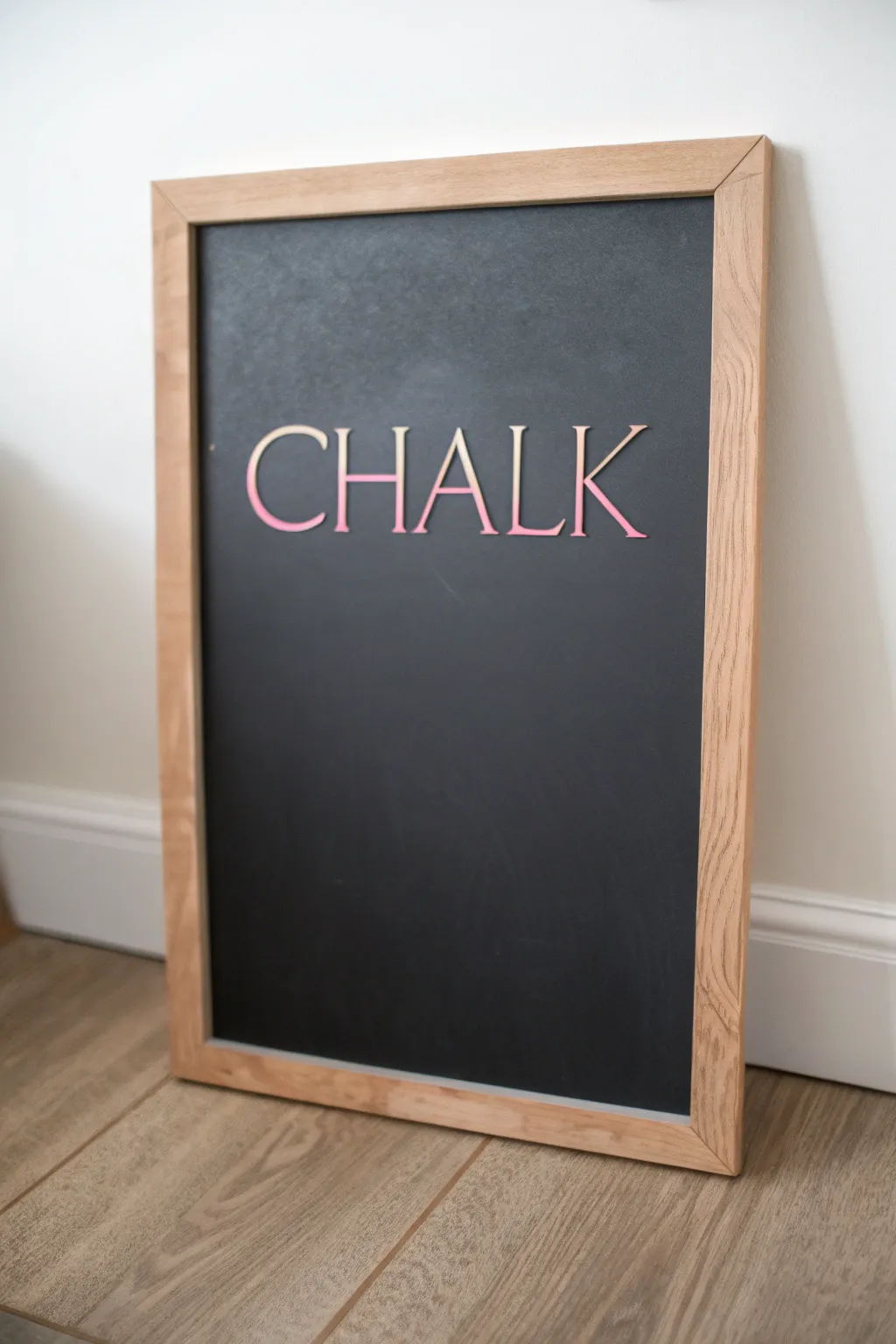 Layered ombre chalk lettering on a dark board, showcasing smooth blends and rich tonal depth.