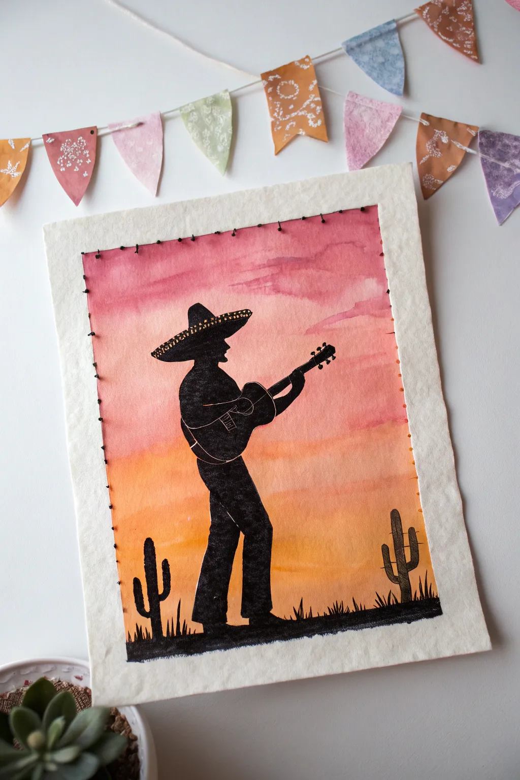 Bold mariachi silhouette on a soft sunset gradient, minimalist Cinco de Mayo art to paint