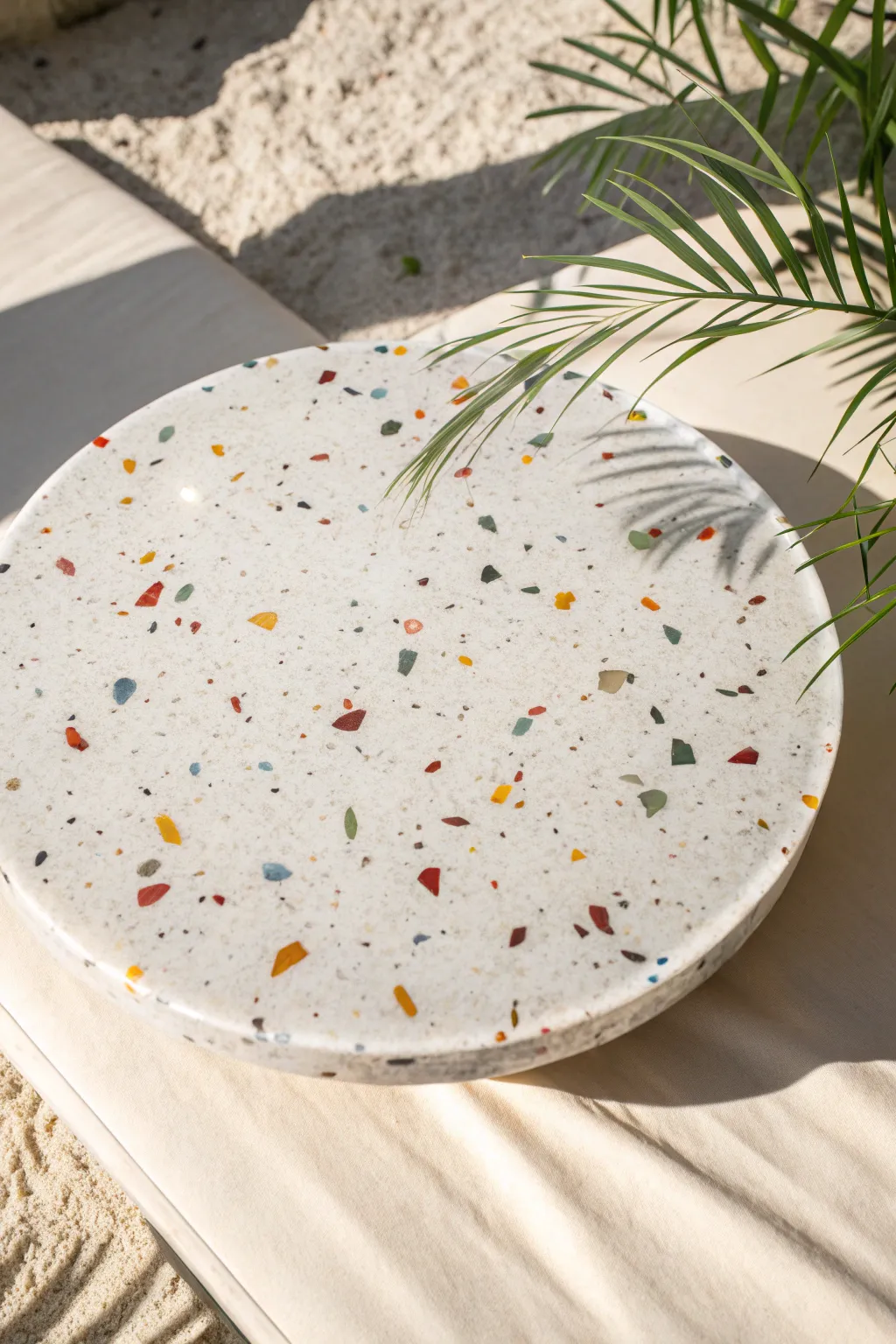 Terrazzo confetti resin tabletop, crisp overhead shot with bright chips and clean contrast