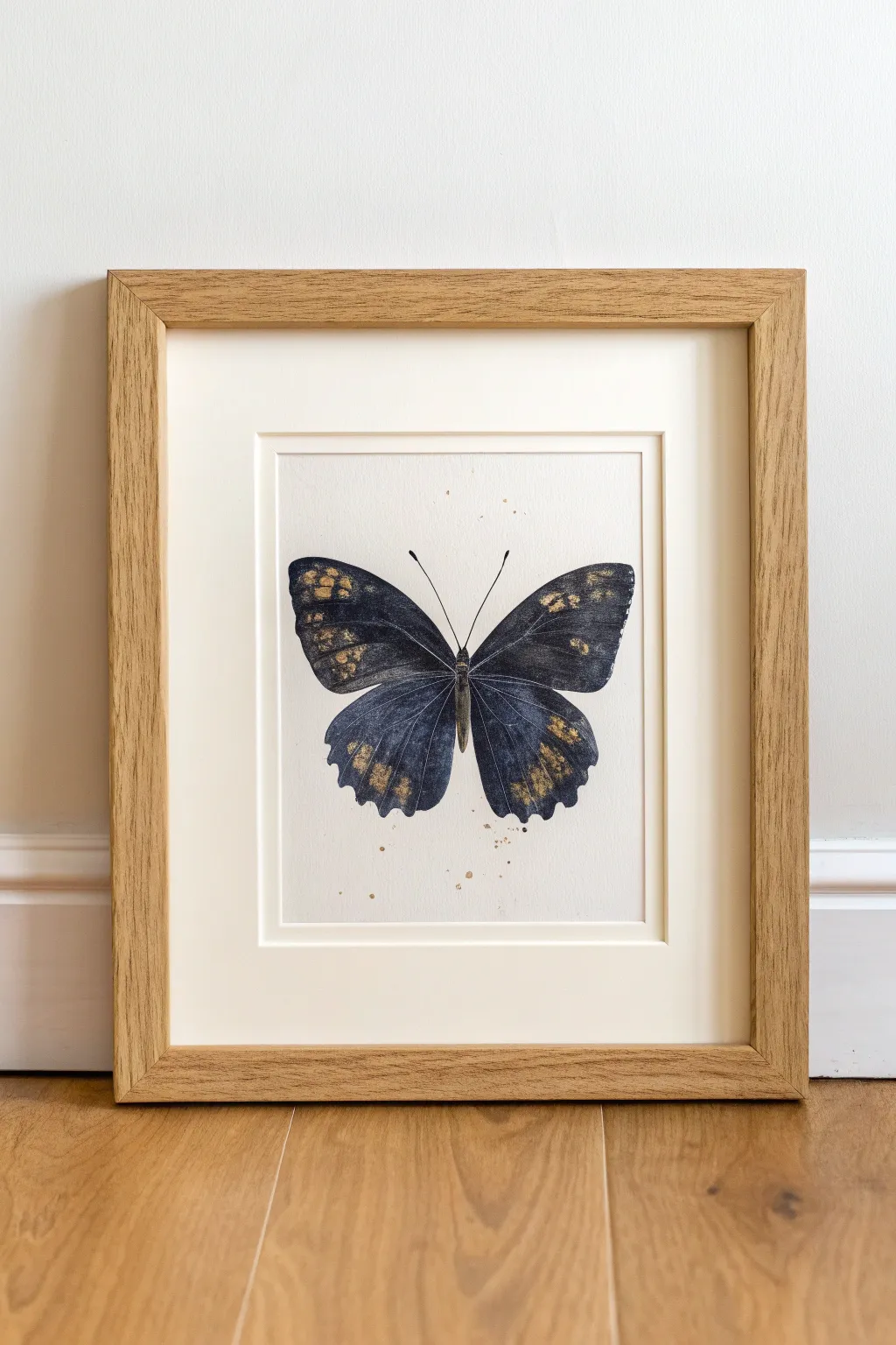 Minimalist butterfly silhouette art with delicate foil accents, perfect for elegant wall decor