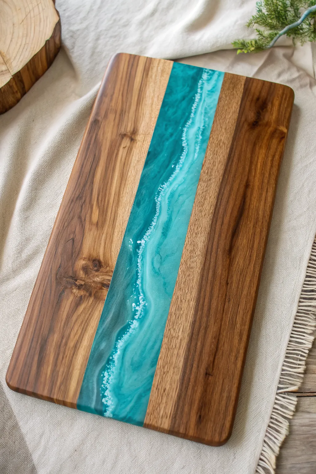 Translucent resin river and warm wood grain come together in a calm, modern DIY cutting board.