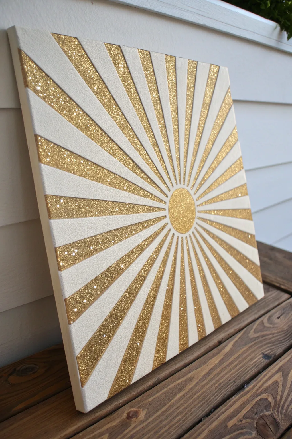 Crisp sunburst rays with alternating matte paint and loose glitter for a calm, sparkly contrast