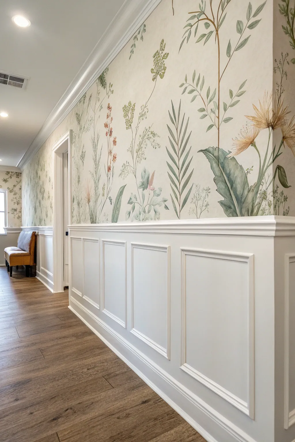 Durable wainscoting below, dreamy botanical mural above for a chic, wipeable hallway.