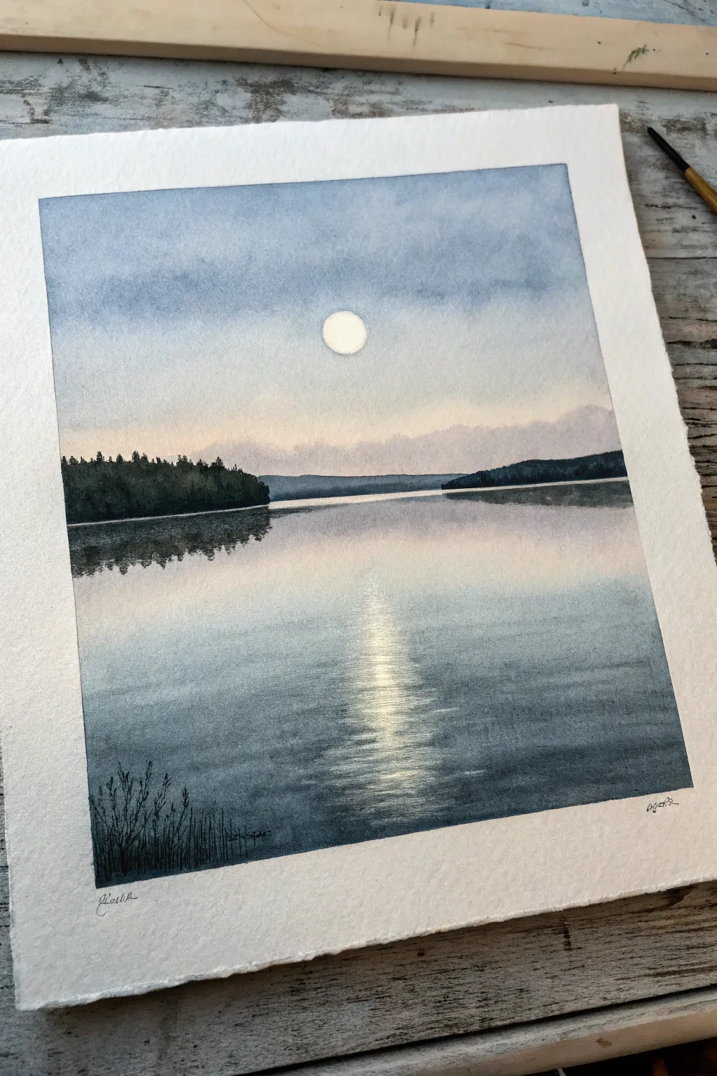 Minimal monochrome lake ripples with moon reflection, calm Scandinavian mood and high contrast.