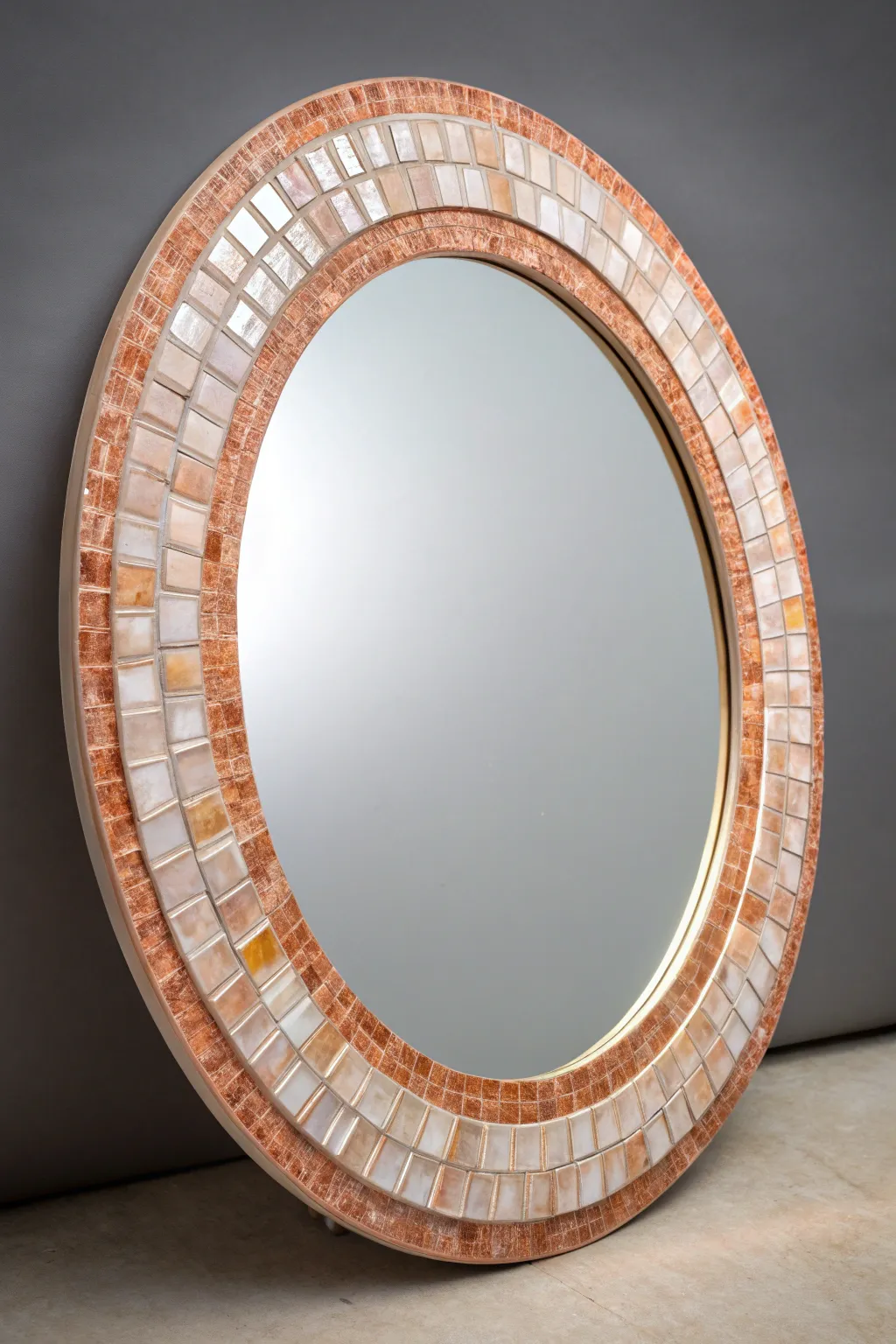 DIY mosaic mirror frame with shimmering gradient glass tiles and tactile grout texture