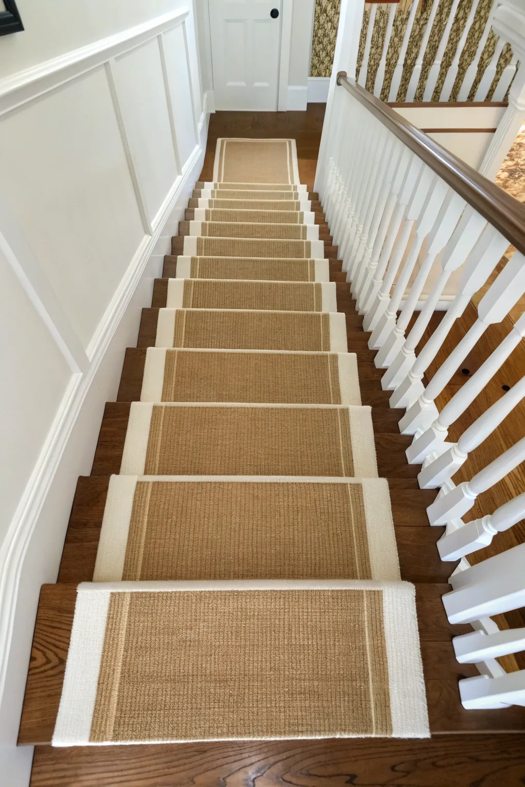 Wide painted reveal borders frame a centered runner for a clean, balanced stair look