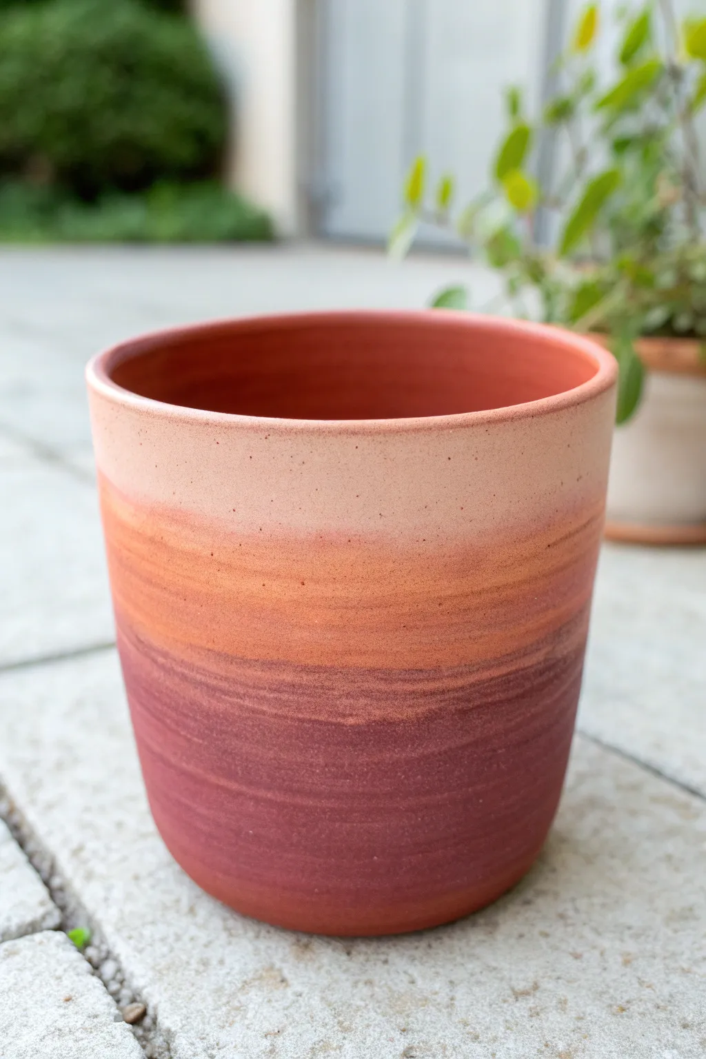 Soft sunset ombre flower pot in matte ceramic, a minimalist boho pop for summer patios.
