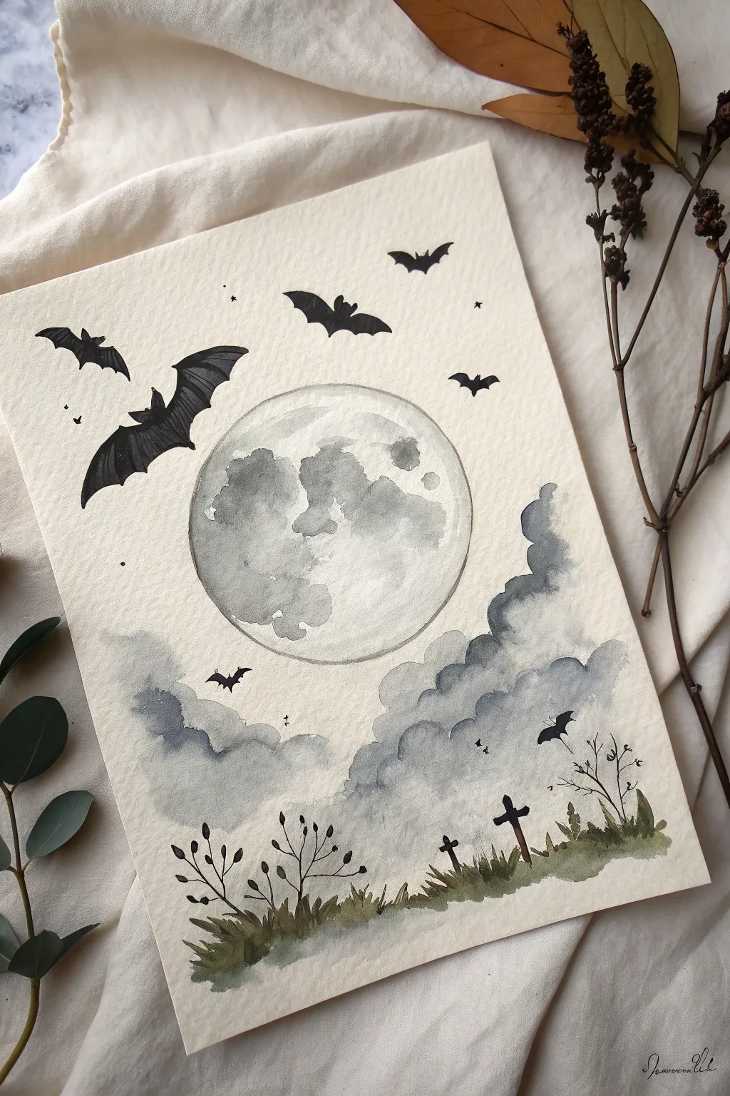 Moody bat silhouettes sweep across a luminous full moon for a spooky minimalist drawing idea.