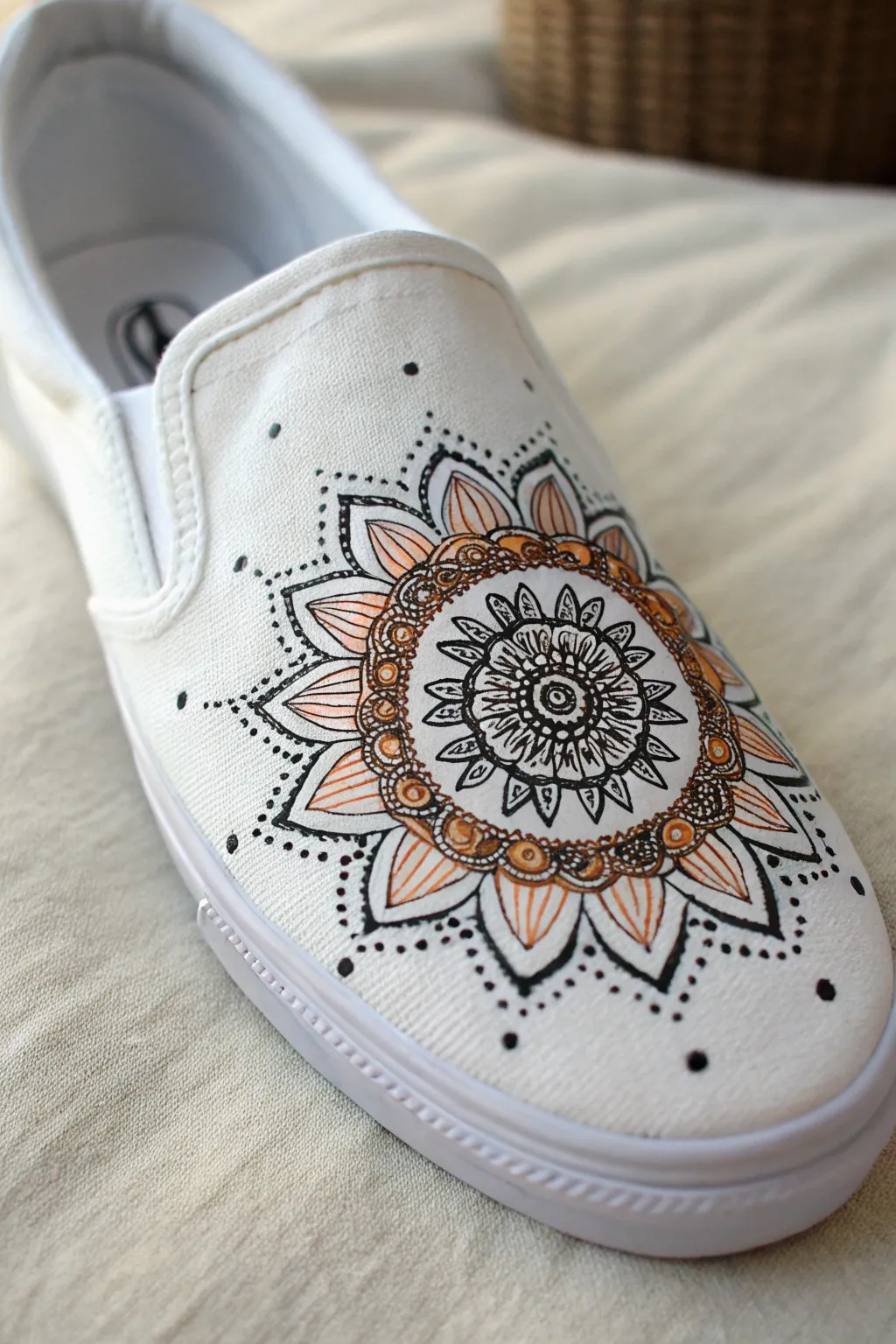 White slip-on with a crisp acrylic mandala medallion, fine dots and rings, clean Scandinavian boho mood.