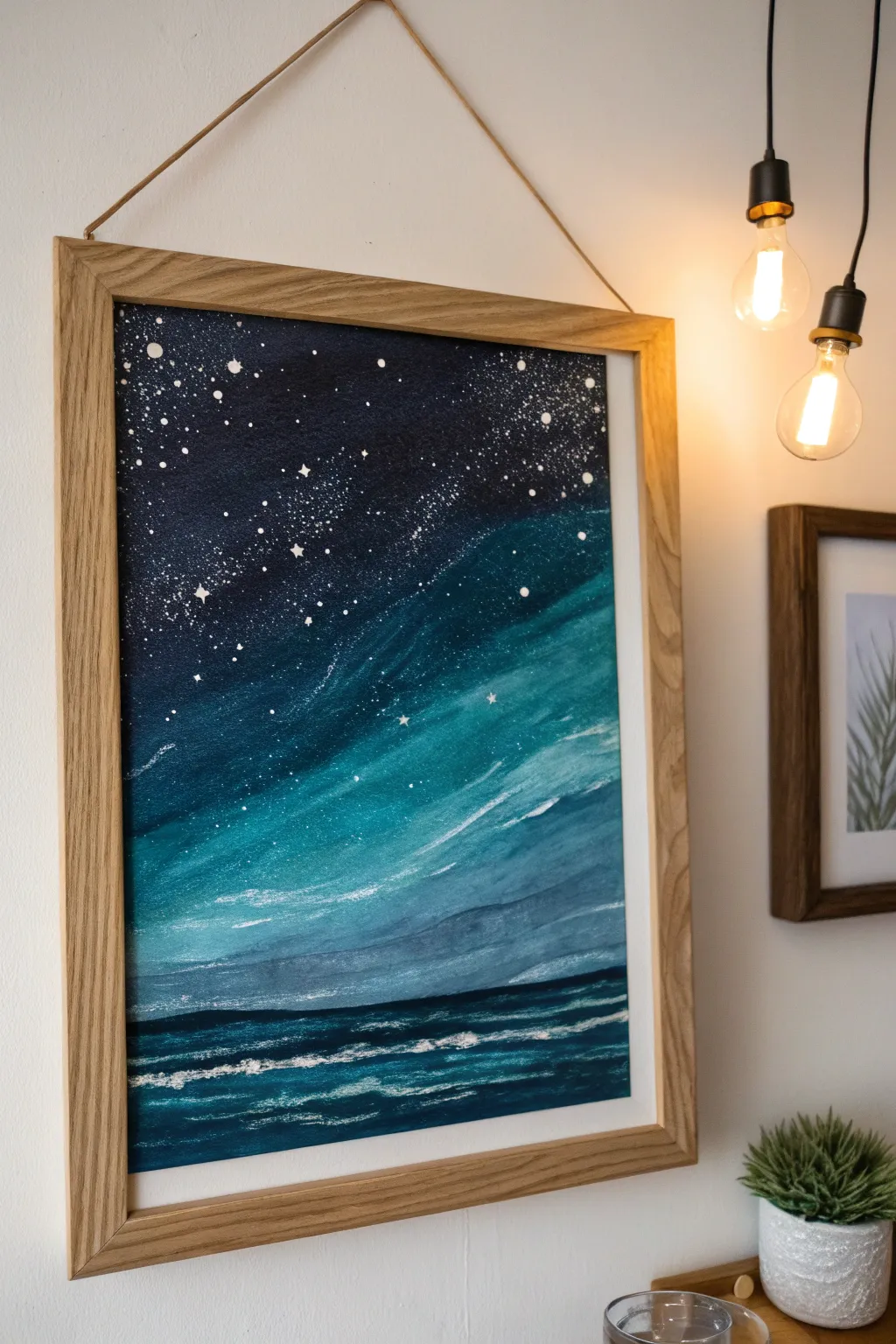 Moody night-sky swirl painting in deep indigo, cozy low light, minimalist boho vibe.