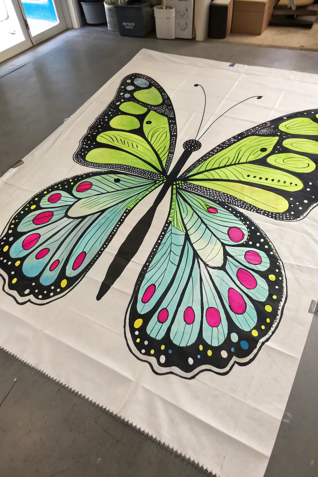 Neon butterfly wing patterns glowing under black light, minimalist, feminine, and easy to recreate.