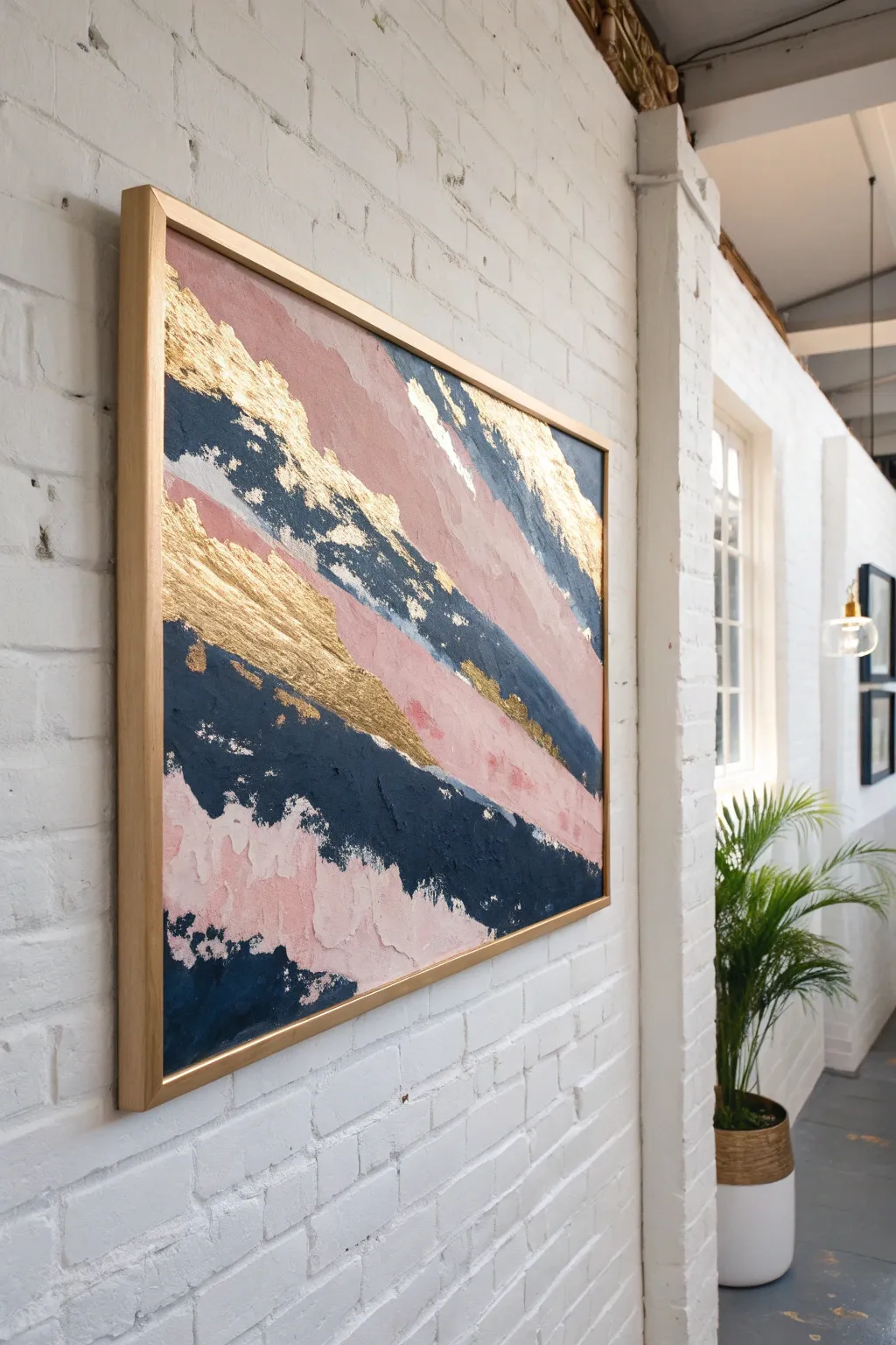 Create stunning abstract art with gold leaf accents for a luxe Boho wall decor look.