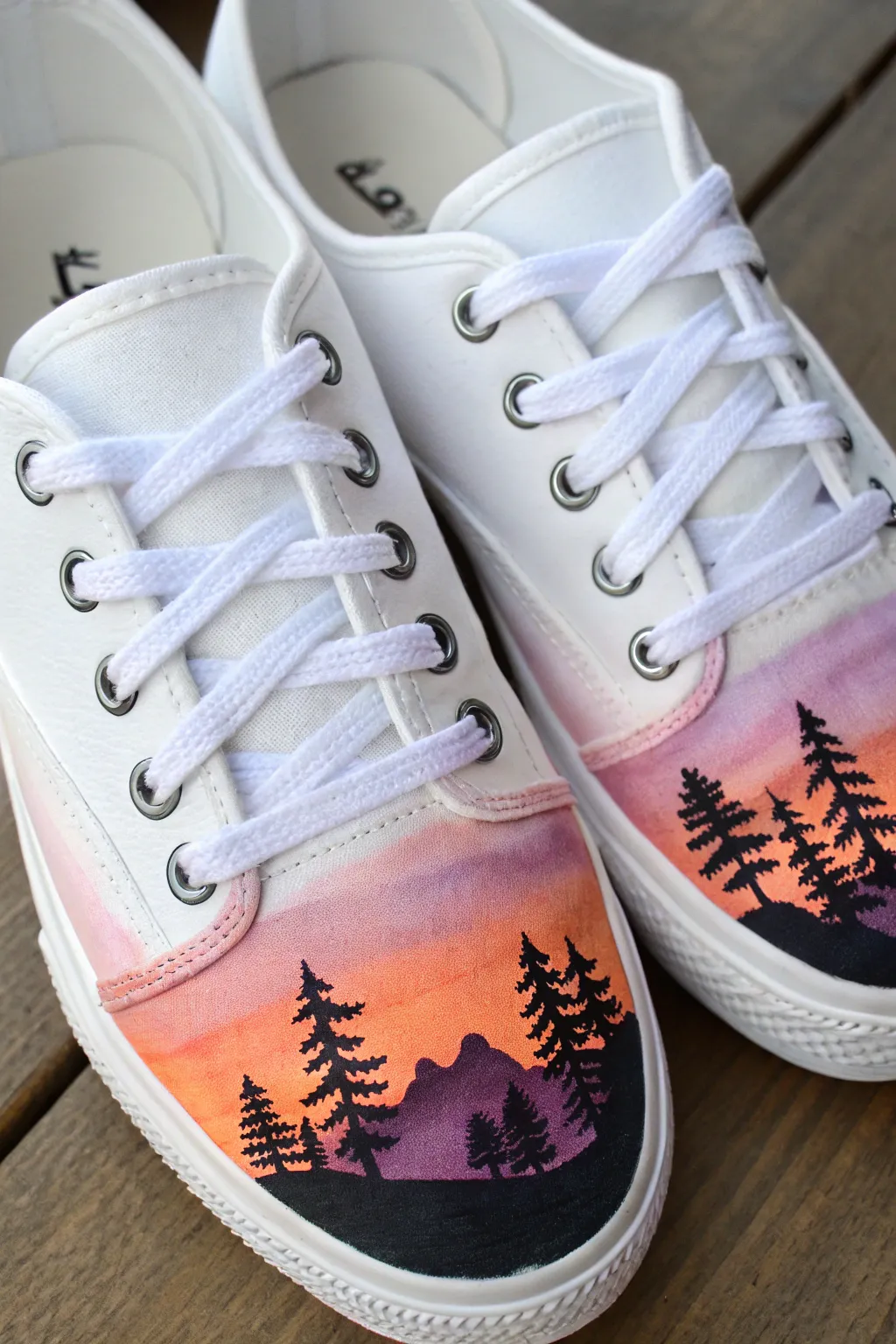 Sunset gradient canvas sneakers with crisp black silhouettes, minimalist boho craft inspiration
