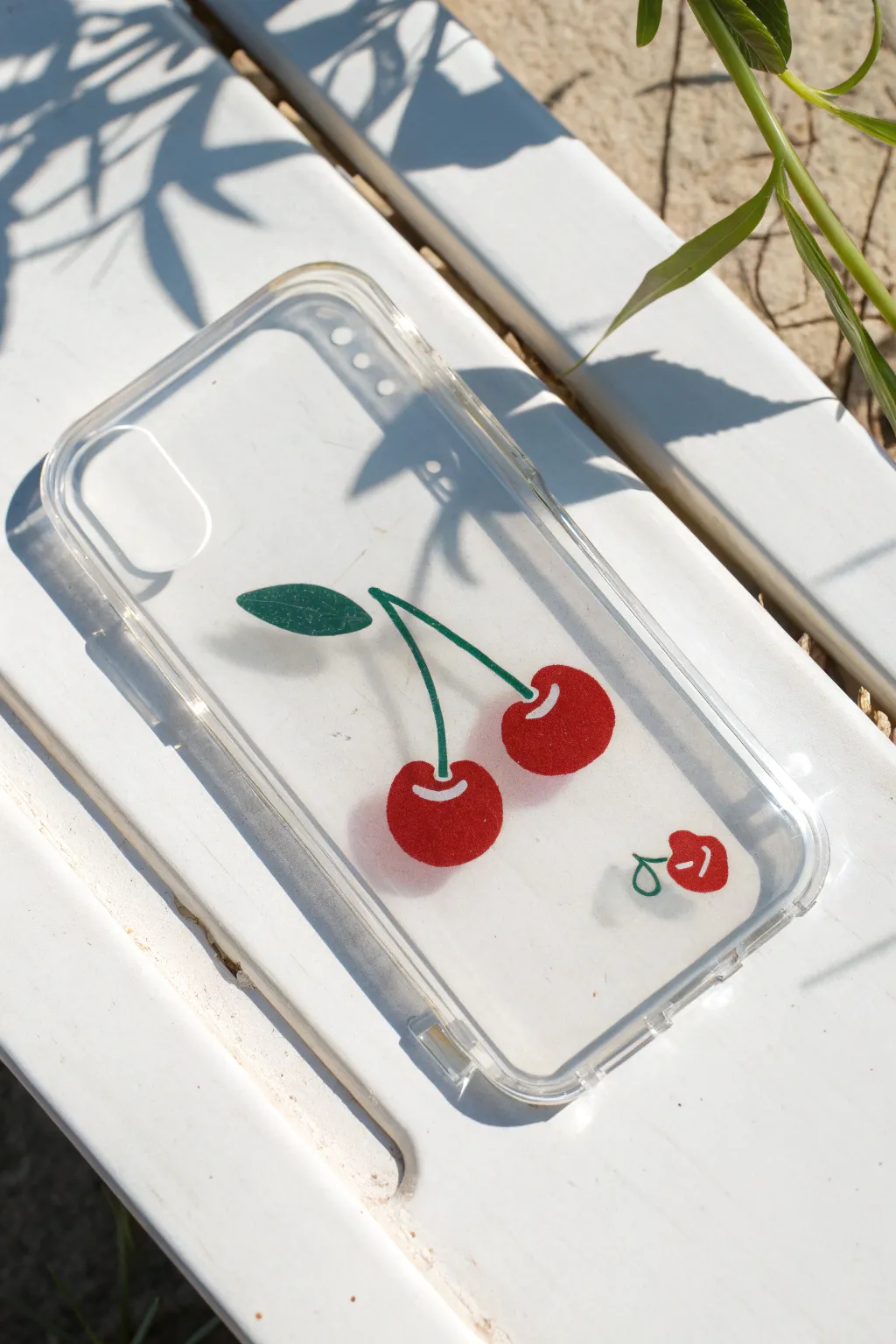 Minimal cherry pair on a clear phone case with tiny highlights, simple and sweet to paint