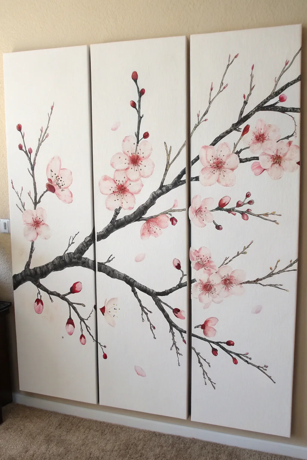 Easy triptych idea: a sweeping dark branch with soft finger-painted cherry blossoms