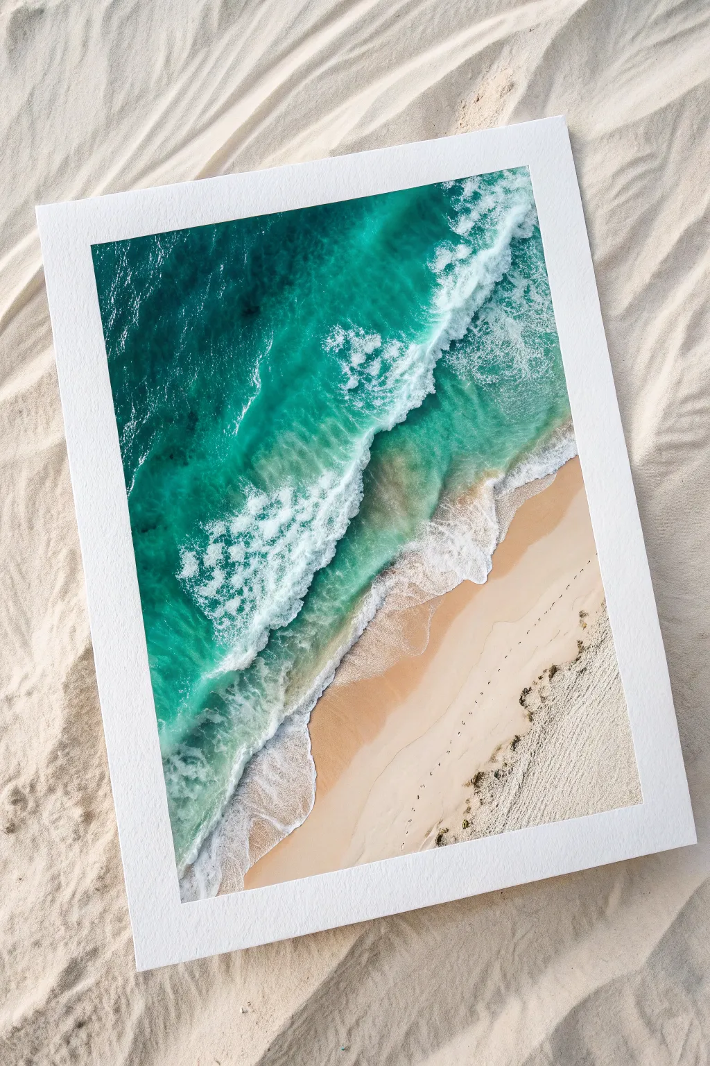 Minimal top-down watercolor waves fading into sand, finished with scalloped sea foam texture