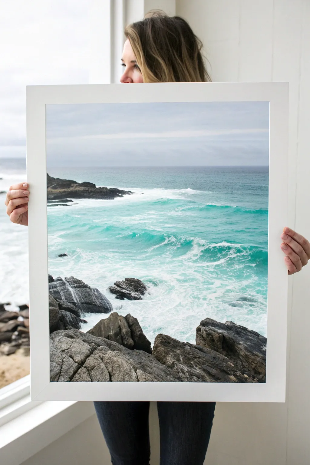 Rocky coast silhouette in bold contrast, bright ocean glow and soft foam, minimalist boho calm
