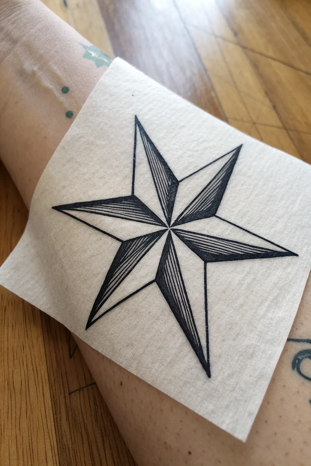 Bold nautical star with crisp black fill and clean symmetry, a timeless tattoo sketch for men.
