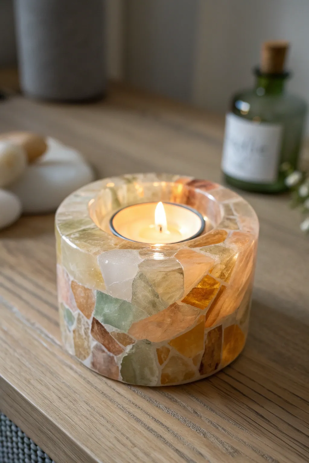 Glowing layered epoxy resin tea light holder with stained glass tints, minimalist boho ambiance