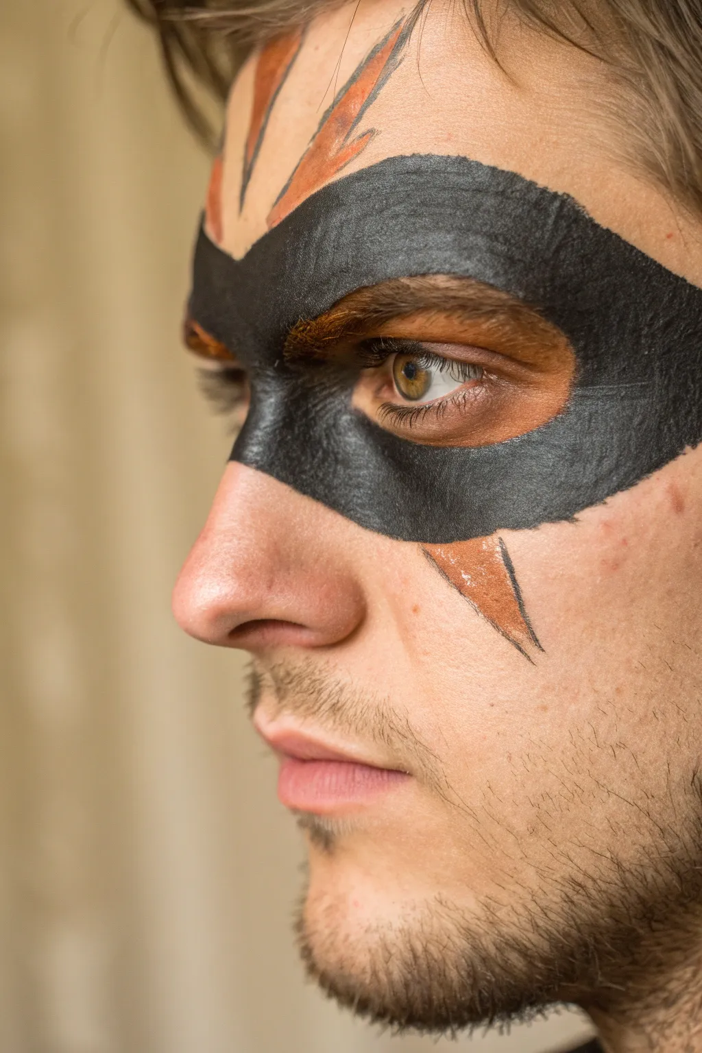 Predator eye claw marks: bold black mask with three ripped streaks, a punchy mens face paint look