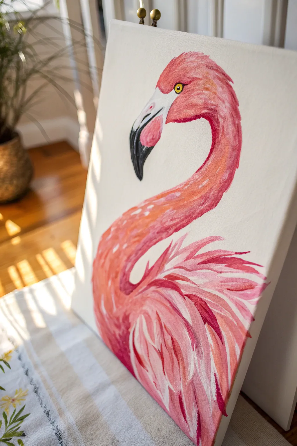 Bold pink acrylic flamingo layers with crisp black-tipped beak detail on a clean backdrop