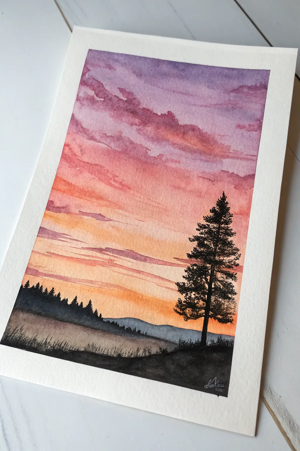 Freestyle silhouette sunset moodscape with a loose blended sky and one bold, calm horizon