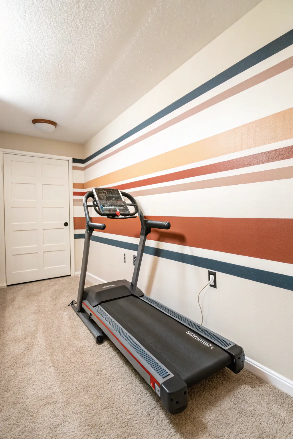 Racing stripes behind a treadmill add instant speed vibes and a chic minimalist gym backdrop