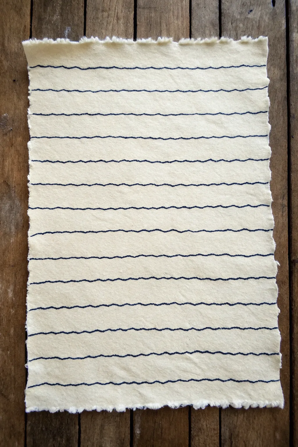 Wavy line ripple bands in clean black ink, minimalist and calming with natural paper texture.