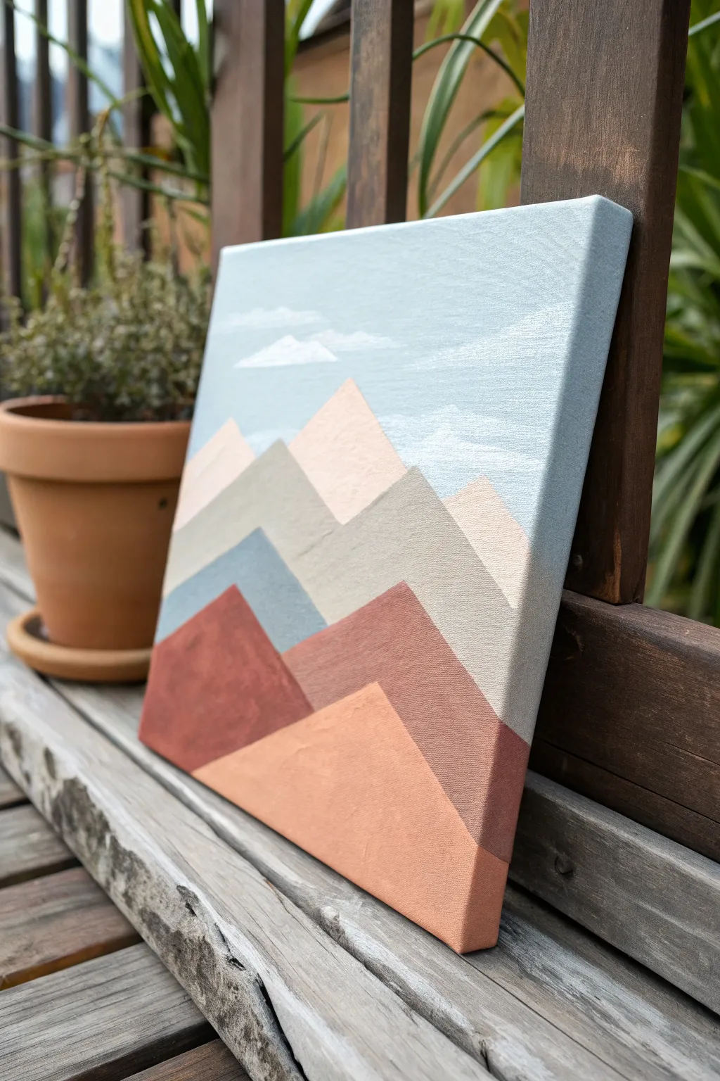 Minimal mountain layers on a small canvas in muted tones with a pale sky wash, calm and modern