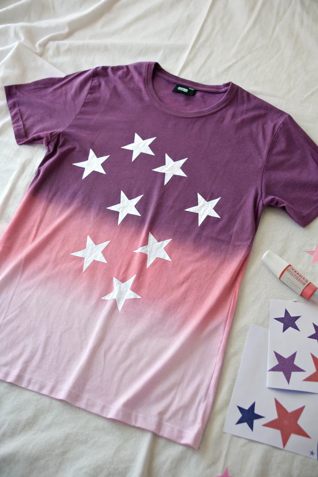 Purple to pink spray-painted tee with crisp star cutouts, minimalist boho stencil inspiration