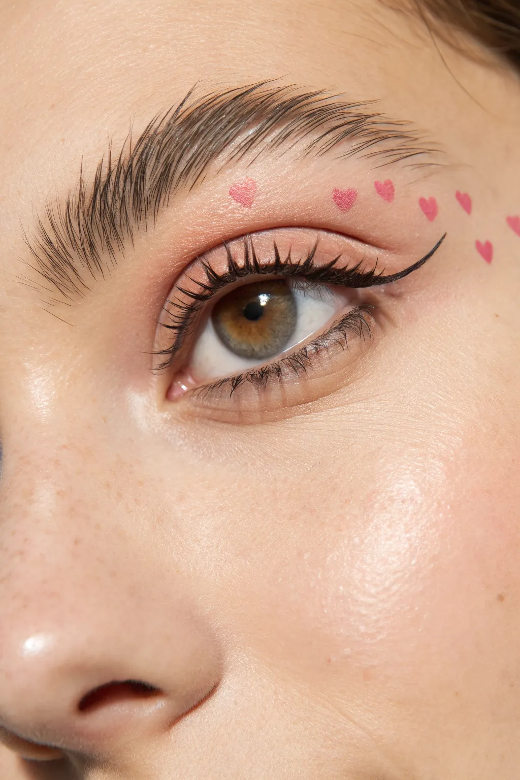 Sweet heart wing liner: a tiny heart flick with micro hearts for an easy Valentine look