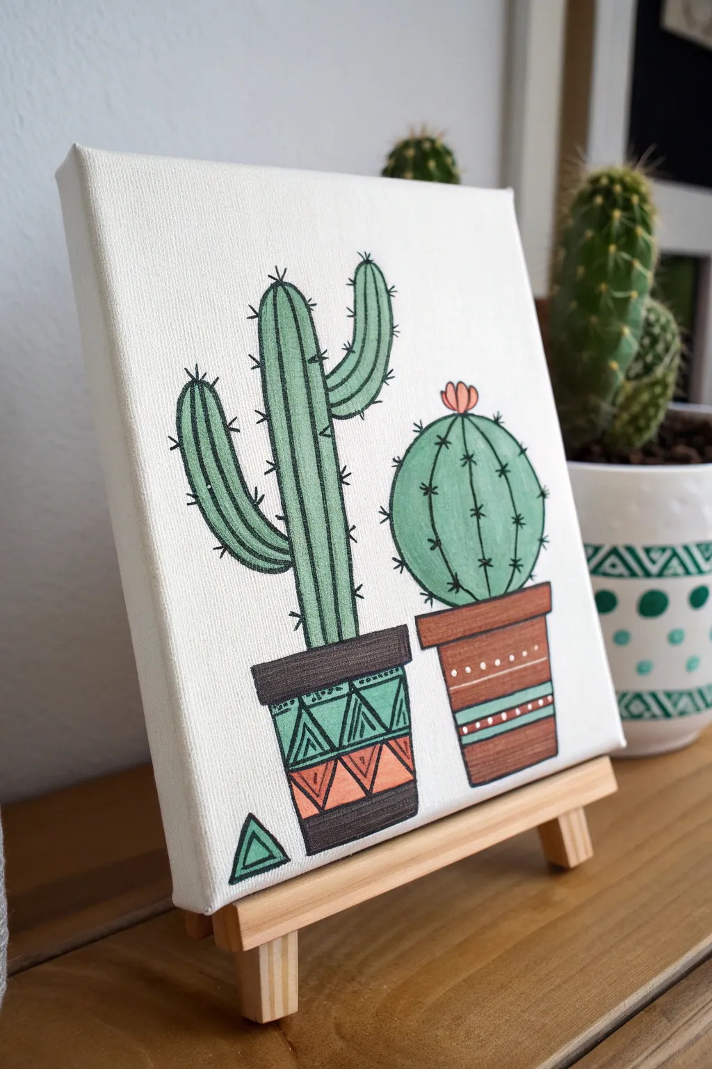 Beginner acrylic cactus trio in simple patterned pots, minimalist boho palette, clean lines