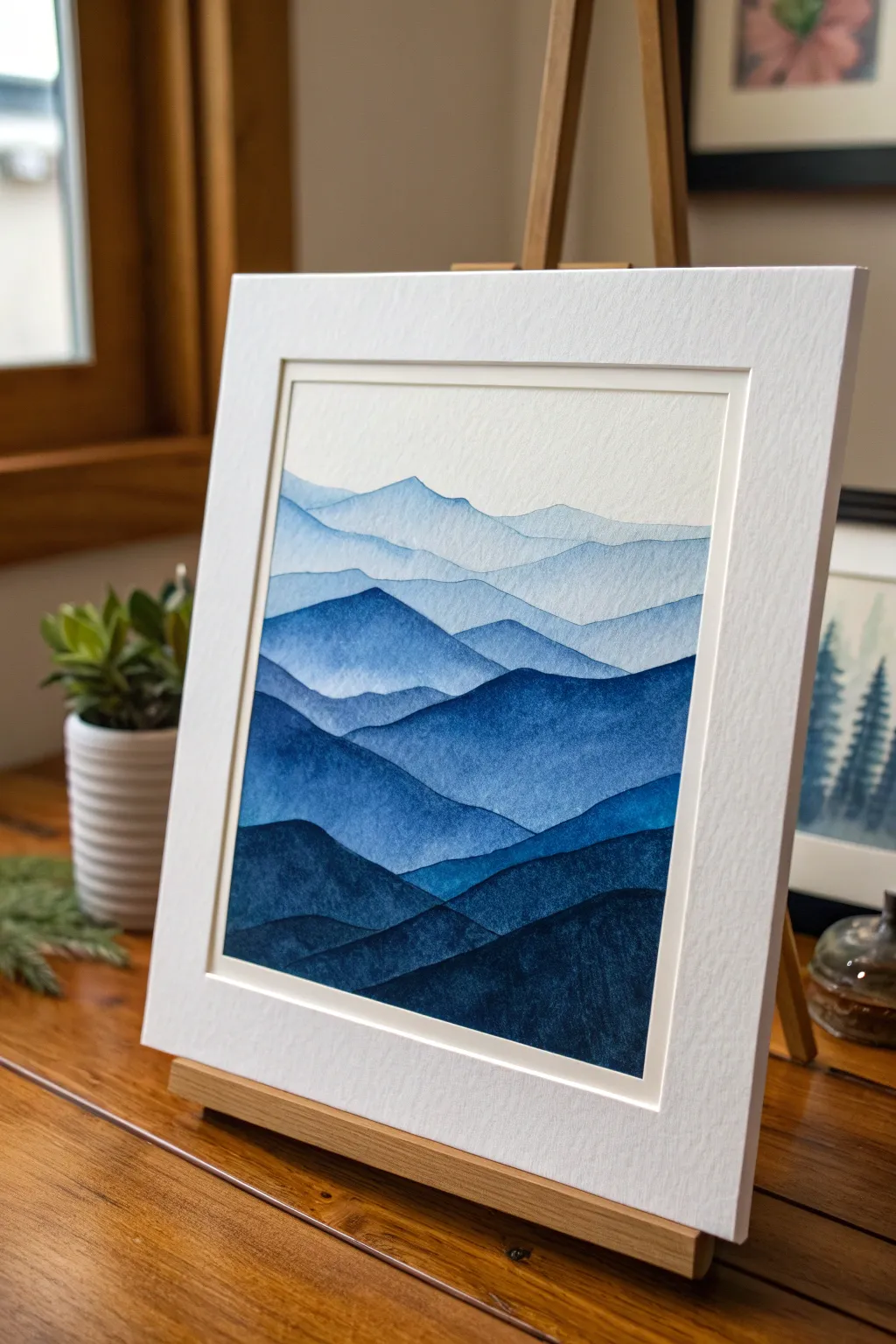 Create serenity with this simple yet stunning ombre mountain painting guide.