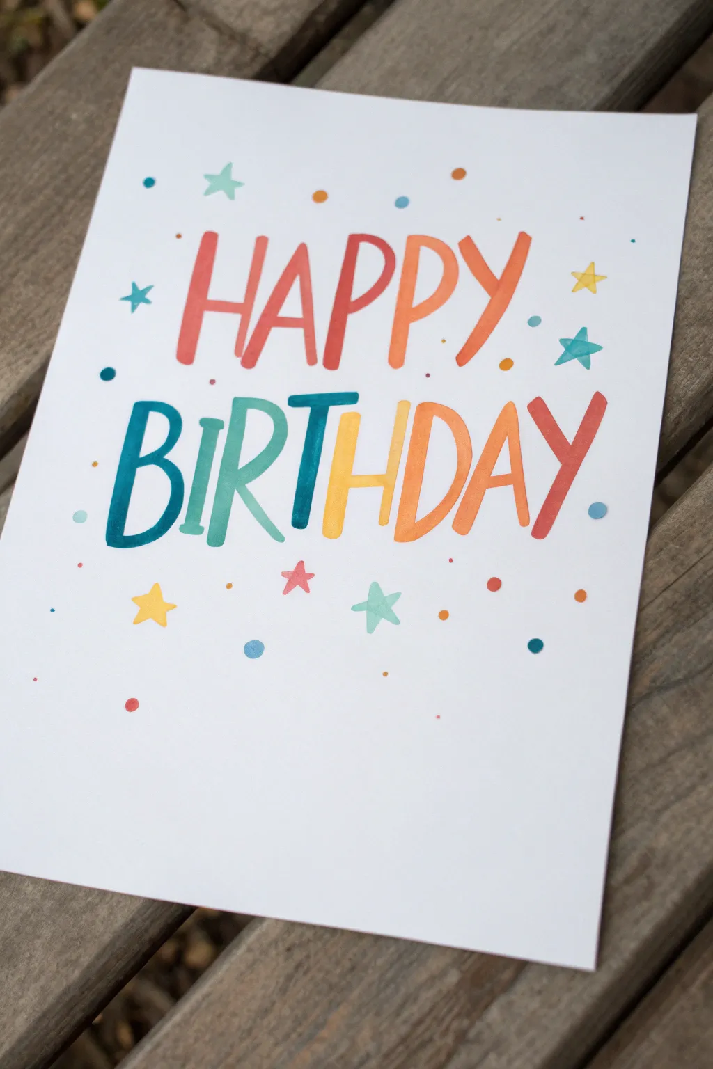 Bold hand-lettered birthday art with colorful shadows and tiny star accents, minimalist vibe.