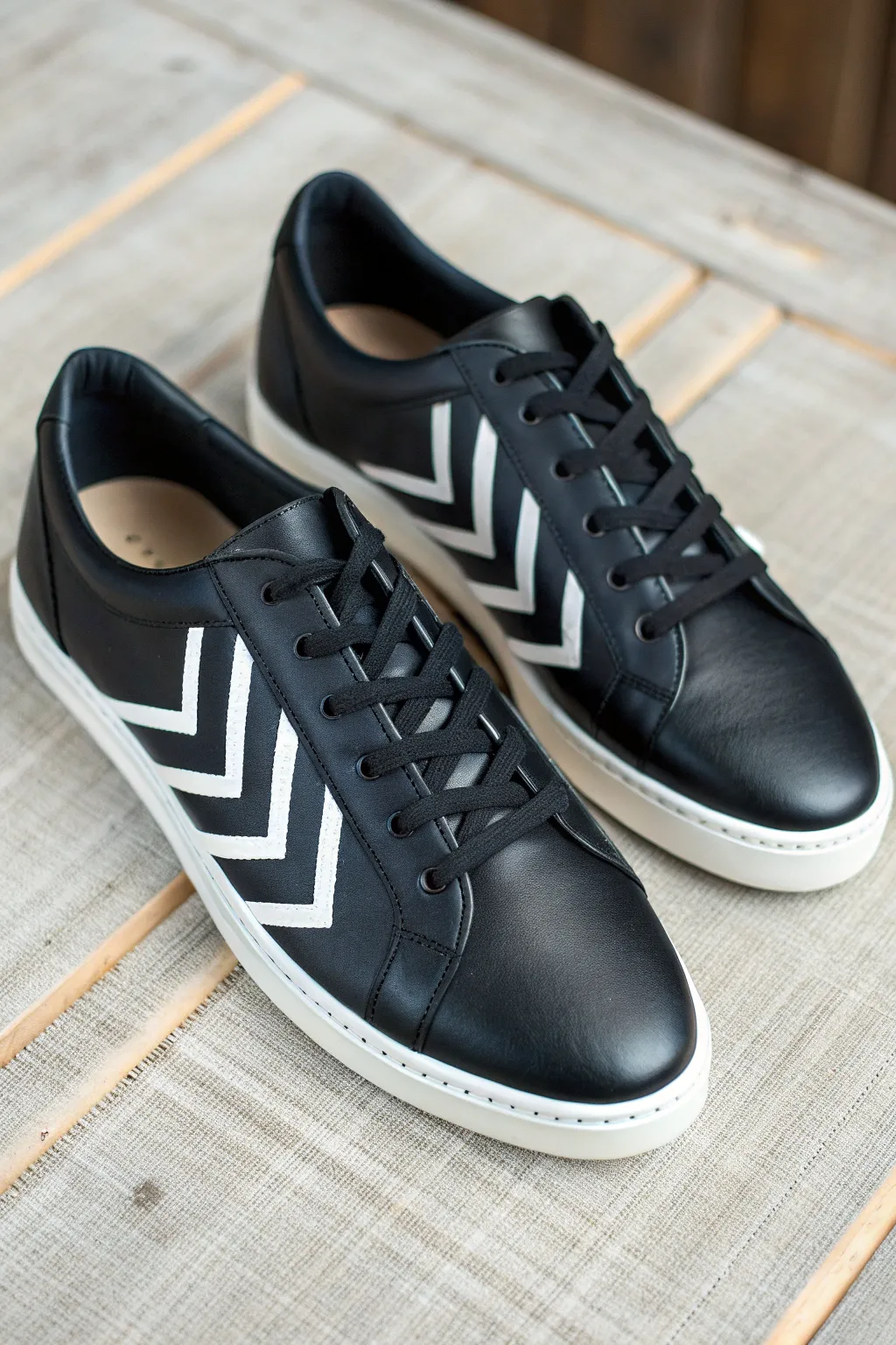 Minimalist white chevrons on black shoes for a bold, clean Scandinavian-boho vibe.