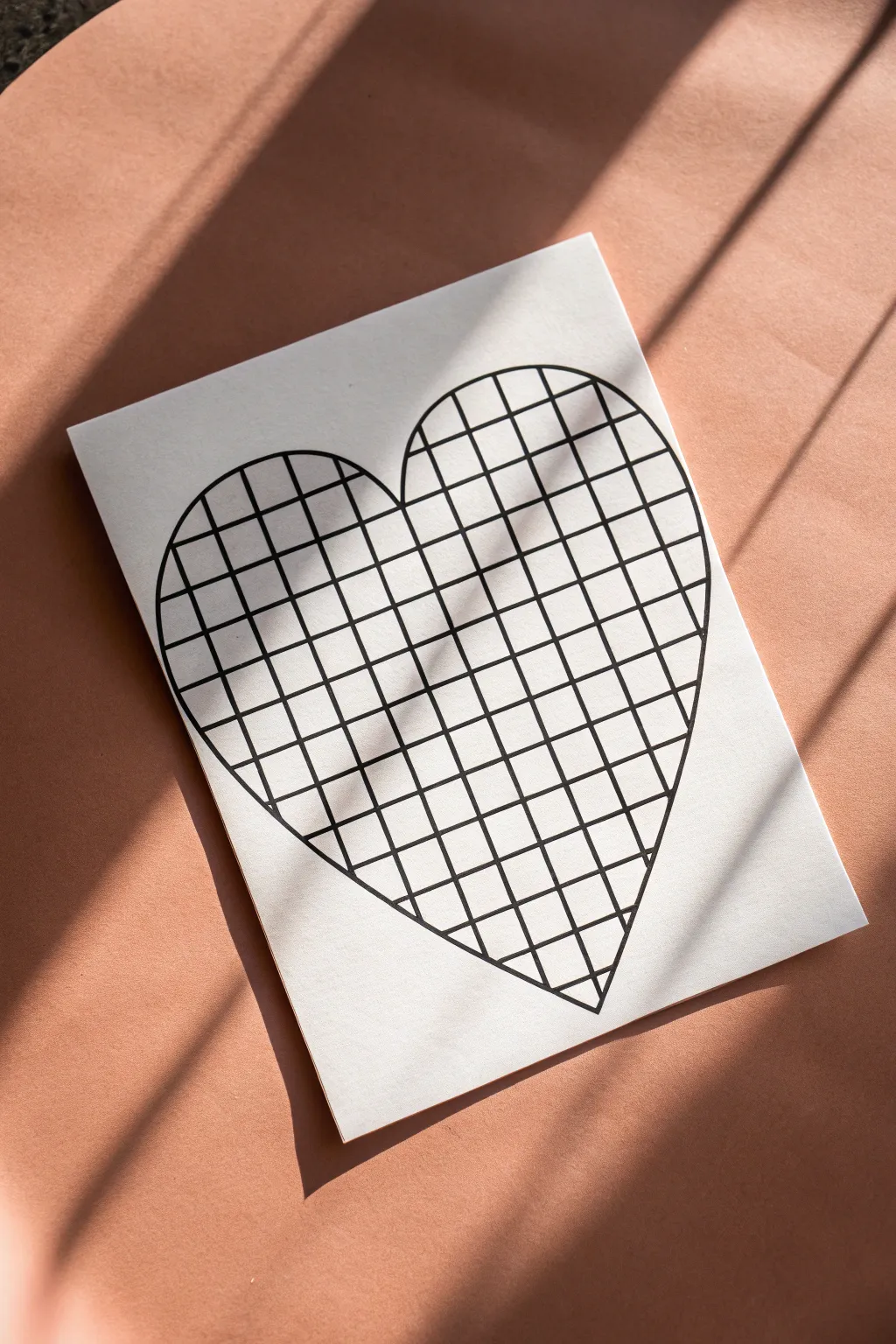 Minimalist checkerboard heart with subtle curved grid lines for a chic 3D drawing effect