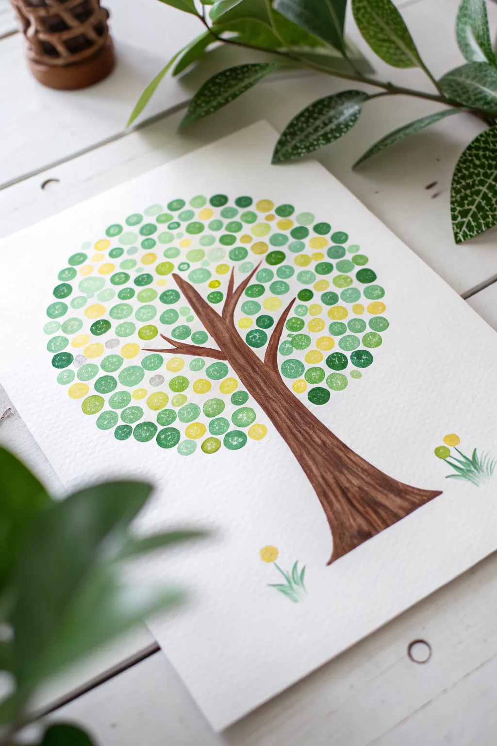 Layered dot canopy tree painting idea with crisp greens, sunny yellow, and bright white highlights