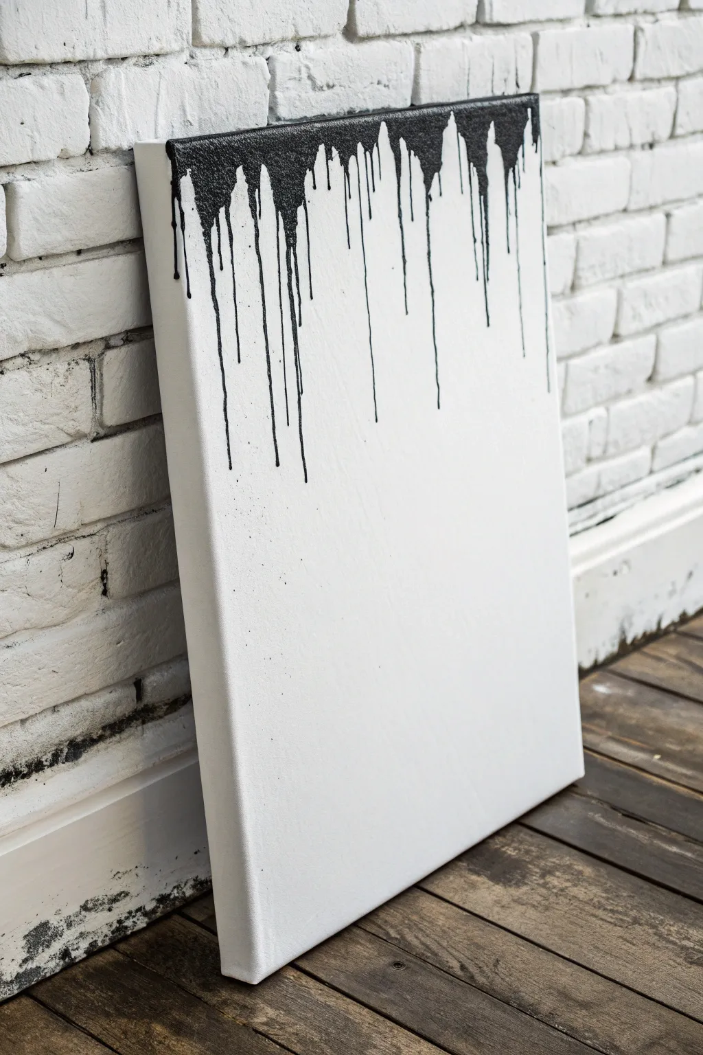 Monochrome drip art with inky black-to-charcoal drips on white for a calm minimalist look.